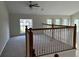 Carpeted loft with windows and railing at 2143 Autumn View Dr, Orlando, FL 32825