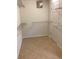 Walk-in closet with tile flooring and wire shelving for ample storage space at 2143 Autumn View Dr, Orlando, FL 32825