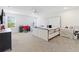 Bright and airy bedroom with plush carpet, a modern ceiling fan, and stylish furniture at 2227 Blue Salvia St, Clermont, FL 34711