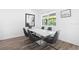 Bright dining room featuring a modern table with seating for six and ample natural light at 2227 Blue Salvia St, Clermont, FL 34711