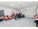 Spacious garage with epoxy floors and ample storage at 2227 Blue Salvia St, Clermont, FL 34711