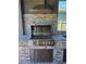 Stainless steel Blaze grill with an outdoor kitchen at 2227 Blue Salvia St, Clermont, FL 34711