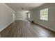 Open living space with new floors, large windows, and lots of natural light at 2318 Mohawk Trl, Maitland, FL 32751