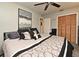 Bedroom featuring neutral walls, ceiling fan, and built in closet at 2810 Nancy St, Orlando, FL 32806