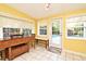 Bright breakfast nook with tile flooring, lots of natural light, and a view of the pool at 2810 Nancy St, Orlando, FL 32806