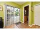 Office with sliding glass door out to pool deck; adjacent to half bathroom at 2810 Nancy St, Orlando, FL 32806