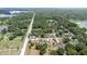 Aerial view of property highlighting proximity to lake and surrounding neighborhood at 309 N Kepler Rd, Deland, FL 32724