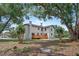 View of spacious backyard featuring a wooden deck perfect for outdoor entertaining at 309 N Kepler Rd, Deland, FL 32724