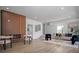Modern living room with wood accent wall, electric fireplace, and stylish furniture at 309 N Kepler Rd, Deland, FL 32724