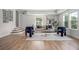 Bright living room featuring modern seating, ample natural light, and stylish decor at 309 N Kepler Rd, Deland, FL 32724