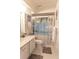 Cozy bathroom showcasing decorative shower curtain and a white vanity at 314 Windmeadows St # 314, Altamonte Springs, FL 32701