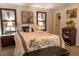 Serene bedroom with a decorative headboard, soft bedding, and ambient lighting at 314 Windmeadows St # 314, Altamonte Springs, FL 32701