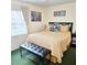Cozy bedroom with plush carpet, decorative artwork, and a comfortable bed with stylish bedding at 314 Windmeadows St # 314, Altamonte Springs, FL 32701