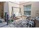 Charming courtyard featuring a swing, lush plants, and a peaceful fountain, perfect for relaxing outdoors at 314 Windmeadows St # 314, Altamonte Springs, FL 32701