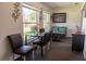 Inviting dining area featuring modern table and chairs, complemented by charming decor and natural light at 314 Windmeadows St # 314, Altamonte Springs, FL 32701