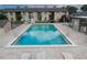 Aerial view of the sparkling community pool with ample seating and well-maintained landscaping at 314 Windmeadows St # 314, Altamonte Springs, FL 32701