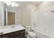 Well-lit bathroom featuring a tub, shower, and sleek vanity with countertop at 328 Cedar Bark Ln, Sanford, FL 32771
