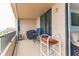 Spacious balcony featuring a seating area with an ocean view and sliding glass door access at 3360 Ocean Shore Blvd # 4050, Ormond Beach, FL 32176