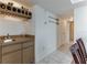Hallway with a wet bar area and wine rack perfect for entertaining guests at 3360 Ocean Shore Blvd # 4050, Ormond Beach, FL 32176