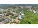 Aerial view of neighborhood featuring lush trees and landscaping at 4052 Gilder Rose Pl, Winter Park, FL 32792