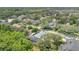 An elevated view of the home's location in a lushly canopied neighborhood at 4052 Gilder Rose Pl, Winter Park, FL 32792