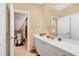 Bathroom with a single sink vanity, ample counter space, and tile floors at 4052 Gilder Rose Pl, Winter Park, FL 32792