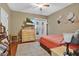 Bedroom featuring a comfortable bed, dresser, and access to a private balcony at 4052 Gilder Rose Pl, Winter Park, FL 32792