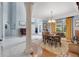 Spacious dining area with grey walls, light colored floors, and a large window for ample light at 4052 Gilder Rose Pl, Winter Park, FL 32792