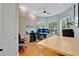 Spacious home office with ample storage, natural light, and a modern workspace at 4052 Gilder Rose Pl, Winter Park, FL 32792