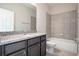 Bathroom with granite countertops and shower-tub combo at 4125 Lavender Ct, Lake Hamilton, FL 33851