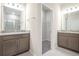 Bathroom featuring double vanities, granite countertops, and ample storage space at 4125 Lavender Ct, Lake Hamilton, FL 33851