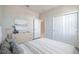 Bright bedroom featuring neutral tones, closet, and complementary decor at 4125 Lavender Ct, Lake Hamilton, FL 33851