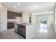 Bright and spacious kitchen features granite countertops, stainless-steel appliances, and an open-concept design at 4125 Lavender Ct, Lake Hamilton, FL 33851