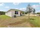Spacious backyard with a covered patio, great for enjoying the outdoors at 4140 Lavender Ct, Lake Hamilton, FL 33851