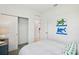 Bright bedroom featuring closet, closet door, coastal decor, and striped bedding at 4140 Lavender Ct, Lake Hamilton, FL 33851