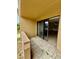 A spacious patio featuring tile flooring with sliding glass doors at 5269 Vineland Rd # 101, Orlando, FL 32811