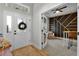 Welcoming entryway with modern door and stylish wreath, leading to a beautifully designed living space at 5478 Nw 153Rd Ct, Morriston, FL 32668