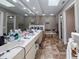 Large bathroom featuring dual sinks, vanity space, a tub, and a separate walk-in shower at 6047 Shore Line Dr, Orlando, FL 32819