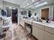 Spacious bathroom with a large vanity, dual sinks, and a walk-in closet at 6047 Shore Line Dr, Orlando, FL 32819