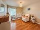 Cozy Bedroom with a crib, changing table, and comfortable glider chair at 6047 Shore Line Dr, Orlando, FL 32819