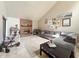 Bright living room with a cozy brick fireplace, neutral color palette, and stylish decor for comfortable living at 6047 Shore Line Dr, Orlando, FL 32819