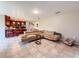 Open concept living area with tile floors flowing into the kitchen, providing a spacious and connected living space at 6047 Shore Line Dr, Orlando, FL 32819