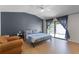Relaxing main bedroom with a king bed, sliding glass doors, and plenty of natural light at 631 Warrenton Rd, Winter Park, FL 32792