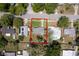 Aerial shot of the property boundaries, the house, backyard, and its immediate surroundings at 826 Cherokee Cir, Sanford, FL 32773