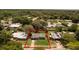 Aerial outline view of the home showcasing the neighborhood, backyard, and surrounding trees at 826 Cherokee Cir, Sanford, FL 32773