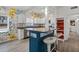 Kitchen featuring granite countertops, modern appliances, floral wallpaper, and a bar with seating at 826 Cherokee Cir, Sanford, FL 32773