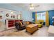 Inviting living room features stylish decor, comfortable seating, and a unique wooden coffee table at 826 Cherokee Cir, Sanford, FL 32773