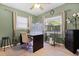 Bright home office with natural light, neutral wall colors, and functional workspace at 826 Cherokee Cir, Sanford, FL 32773