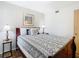 Comfortable bedroom with a queen-sized bed and neutral decor at 8704 Knightsbridge Ct # B, Kissimmee, FL 34747