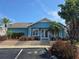 Charming clubhouse with lush landscaping and easy access parking at 8704 Knightsbridge Ct # B, Kissimmee, FL 34747